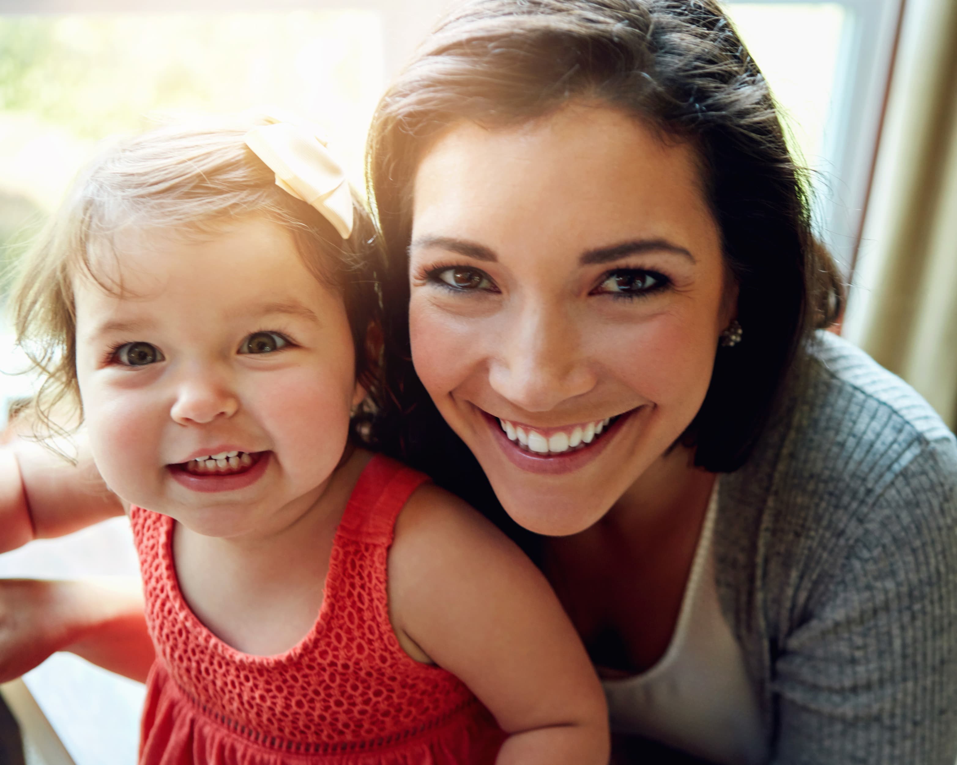 Schonsee Dental happy mother and child smiling in Edmonton
